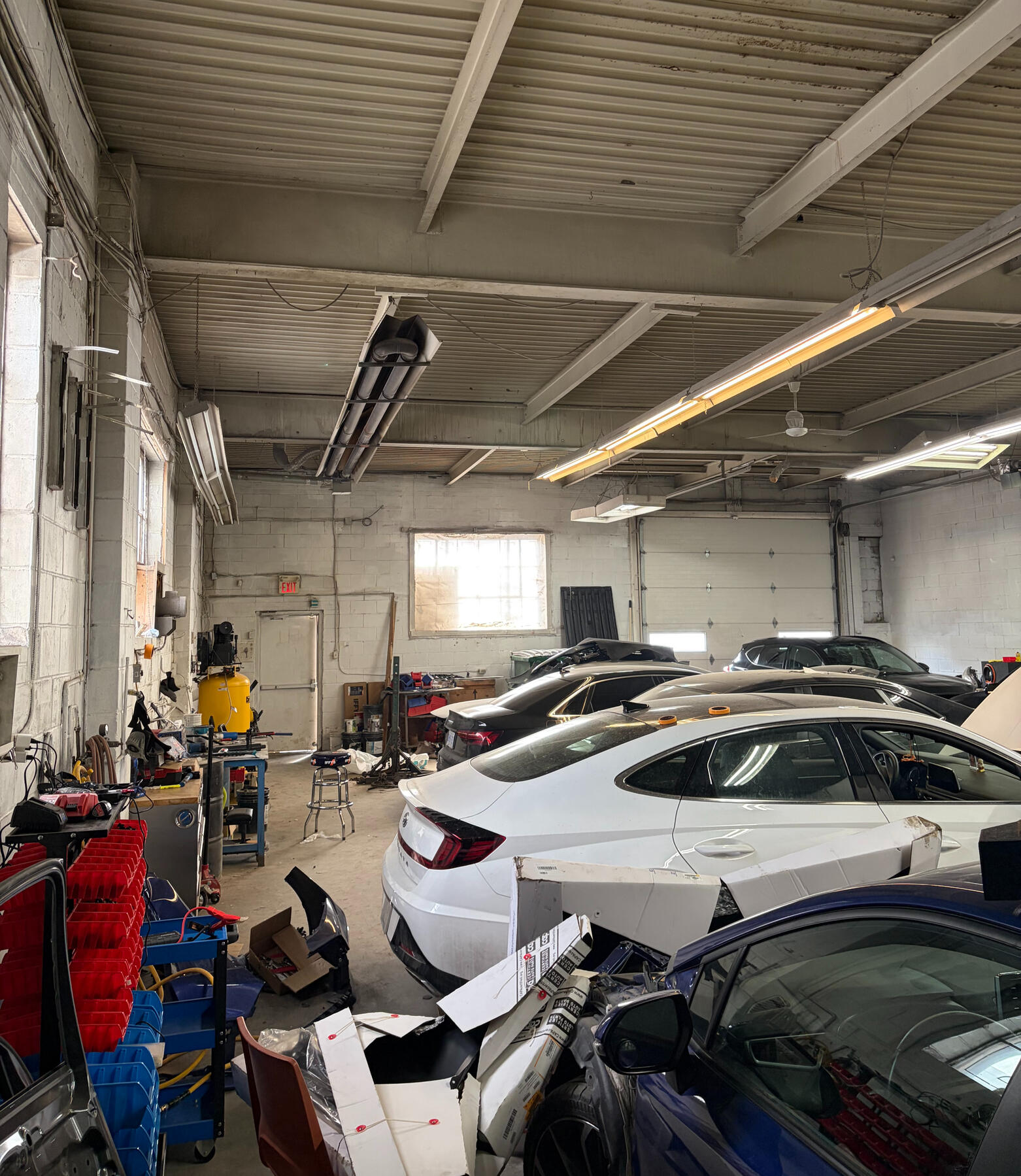 Professional auto painting and refinishing at Etobicoke Humber Collision featuring Garmat USA paint booth system. Computerized color matching and premium clear coat application at 27 Haas Rd Unit A. Insurance approved collision repair facility serving luxu